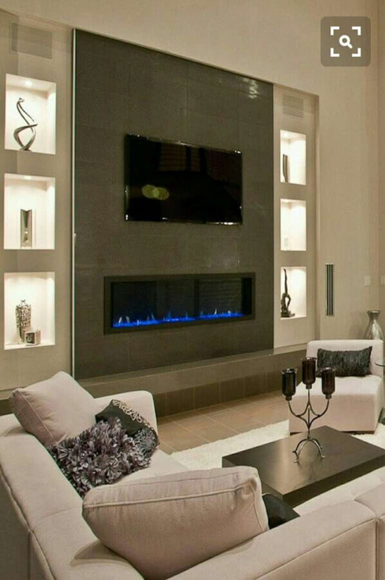 28. Decoração de sala de estar com lareira elétrica moderna – Foto: Pinterest