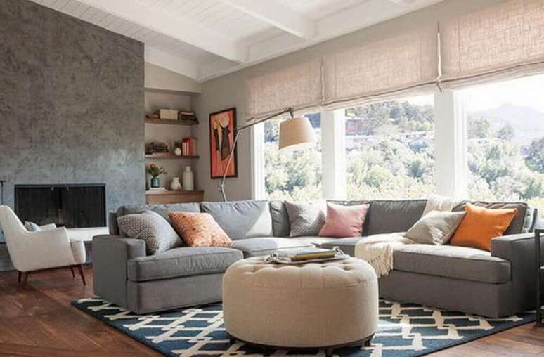 13. Sala industrial iluminada com sof&aacute; de canto cinza &ndash; Foto Pinterest