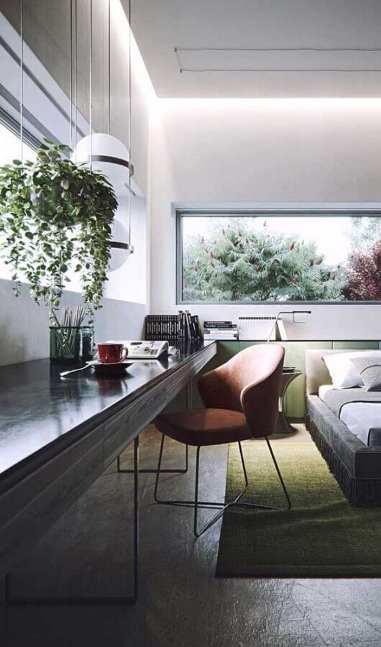 15. Bancada suspensa planejada para decoração moderna de quarto com escritório – Foto: Futurist Architecture