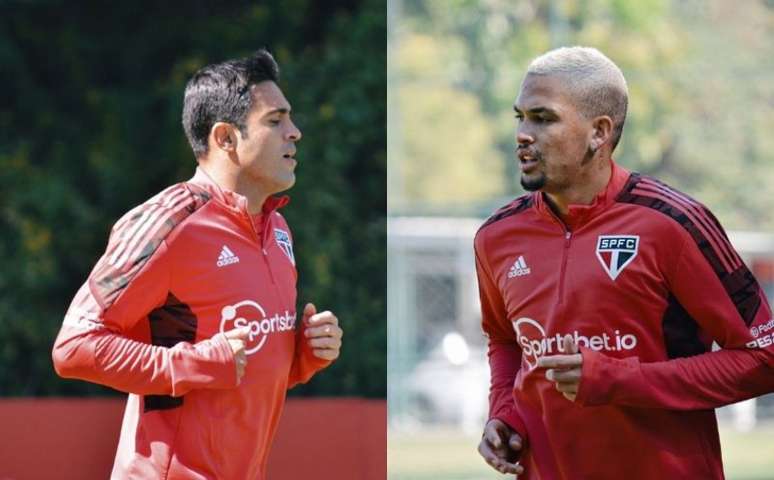 Eder e Luciano durante trabalhos de fisioterapia no gramado (Fotos: Reprodução/Twitter @SaoPauloFC)