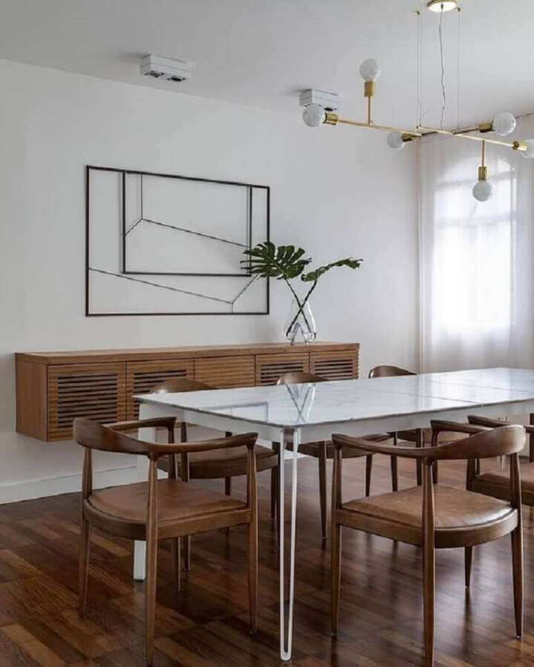 35. Decora&ccedil;&atilde;o minimalista com buffet de madeira para sala de jantar &ndash; Foto: Cristiana Bertolucci Est&uacute;dio