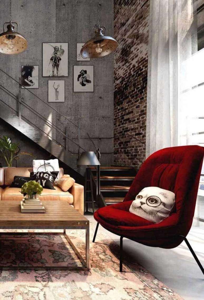 46. Cadeira decorativa vermelha para decoração de sala estilo industrial – Foto: Futurist Architecture