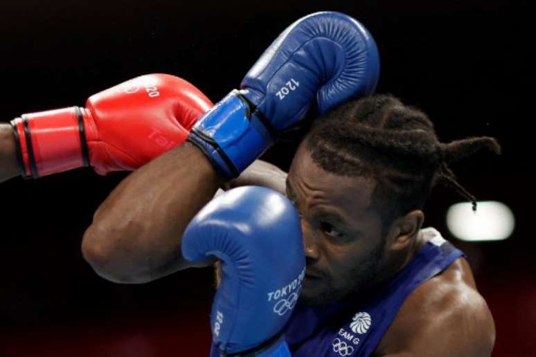 Abner Teixeira está nas quartas de final do boxe (Foto: UESLEI MARCELINO / POOL / AFP)