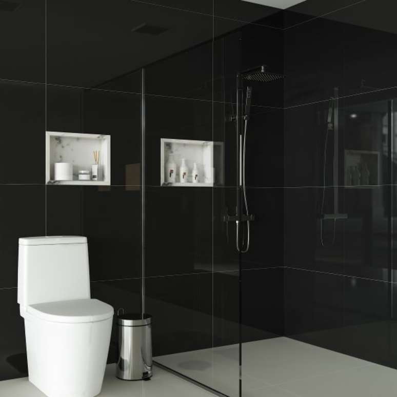 21. Nicho de embutir para banheiro feito com porcelanato preto e decoração branca – Foto Pinterest