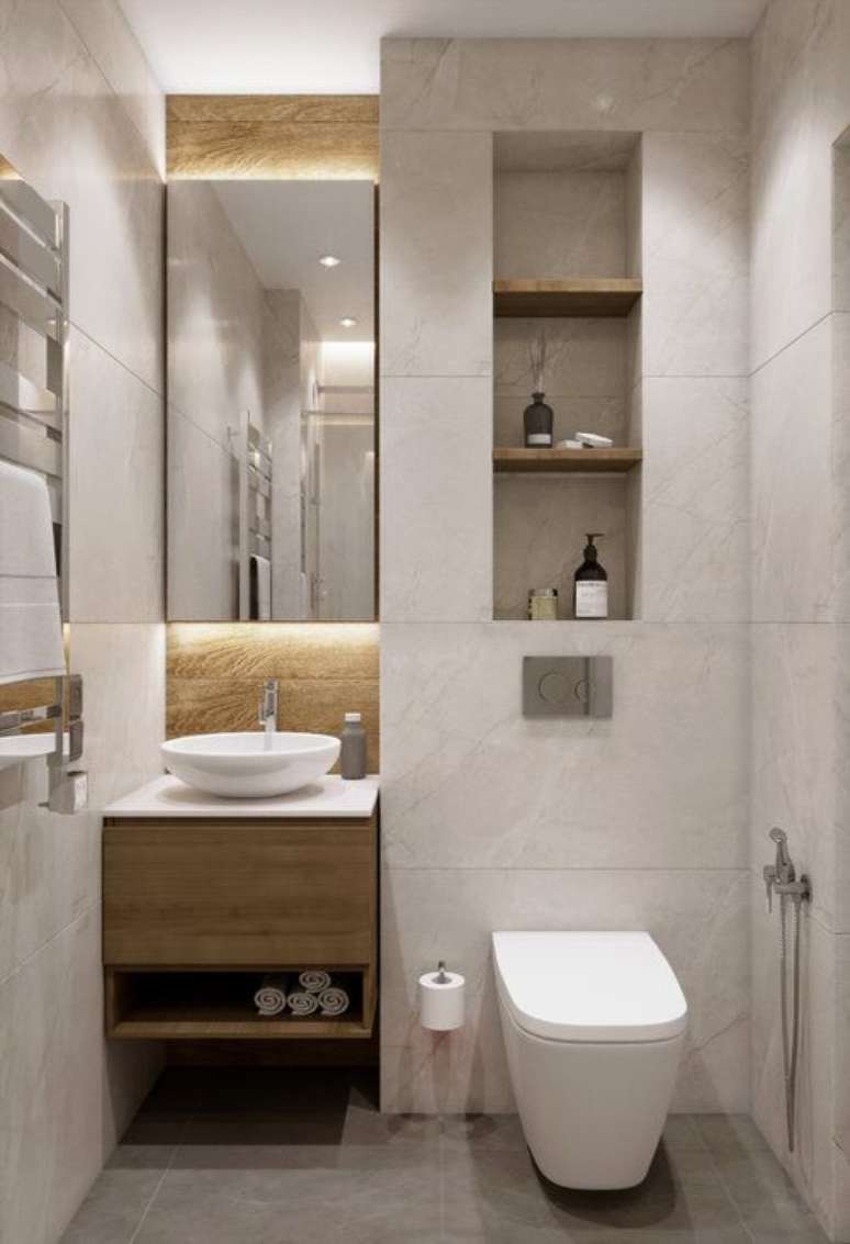 5. Nicho de embutir para banheiro com revestimento amadeirado e branco -Foto Architects