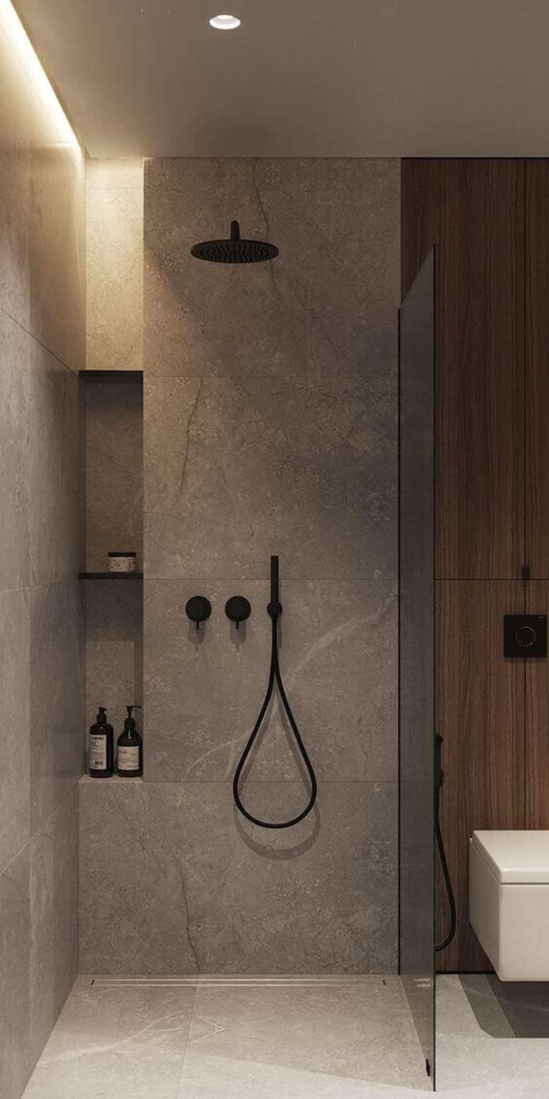 71. Decoração com nicho de embutir para banheiro com chuveiro preto – Foto Pinterest