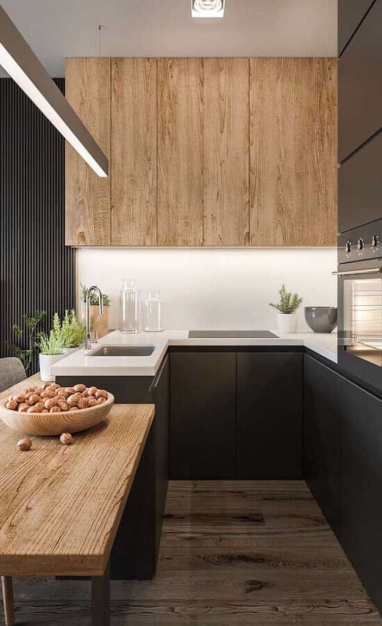 48. Decoração moderna com móveis planejados para cozinha estilo americana cinza com madeira – Foto: Futurist Architecture