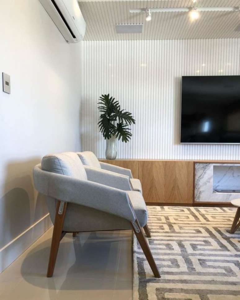 37. Poltronas para sala de espera com tv e decora&ccedil;&atilde;o moderna &ndash; Foto Pinterest