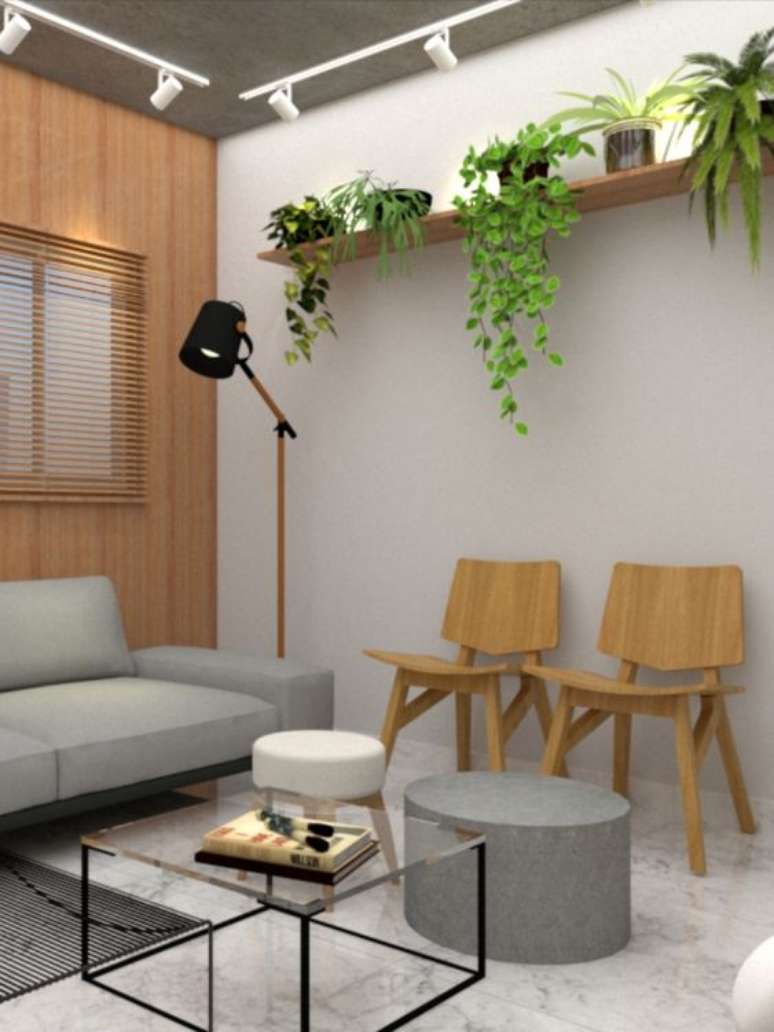 17. Sala de espera para escritório com cadeira de madeira e plantas – Foto Mora Estudio