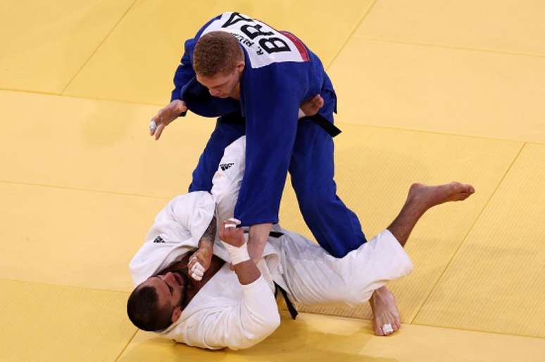 Rafael Buzacarini, do judô, é derrotado na primeira luta da Olimpíada (FOTO: Jack GUEZ / AFP)