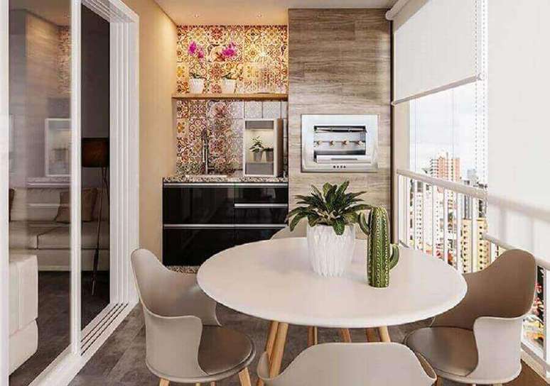 52. Mesa redonda para decoração de varanda gourmet para apartamento pequeno – Foto: Webcomunica