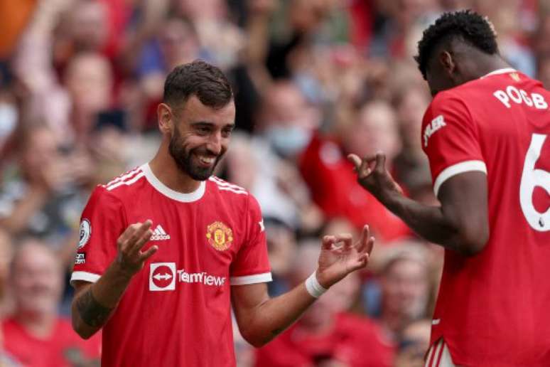 Bruno Fernandes e Pogba foram os responsáveis por vitória do Manchester United (ADRIAN DENNIS / AFP)