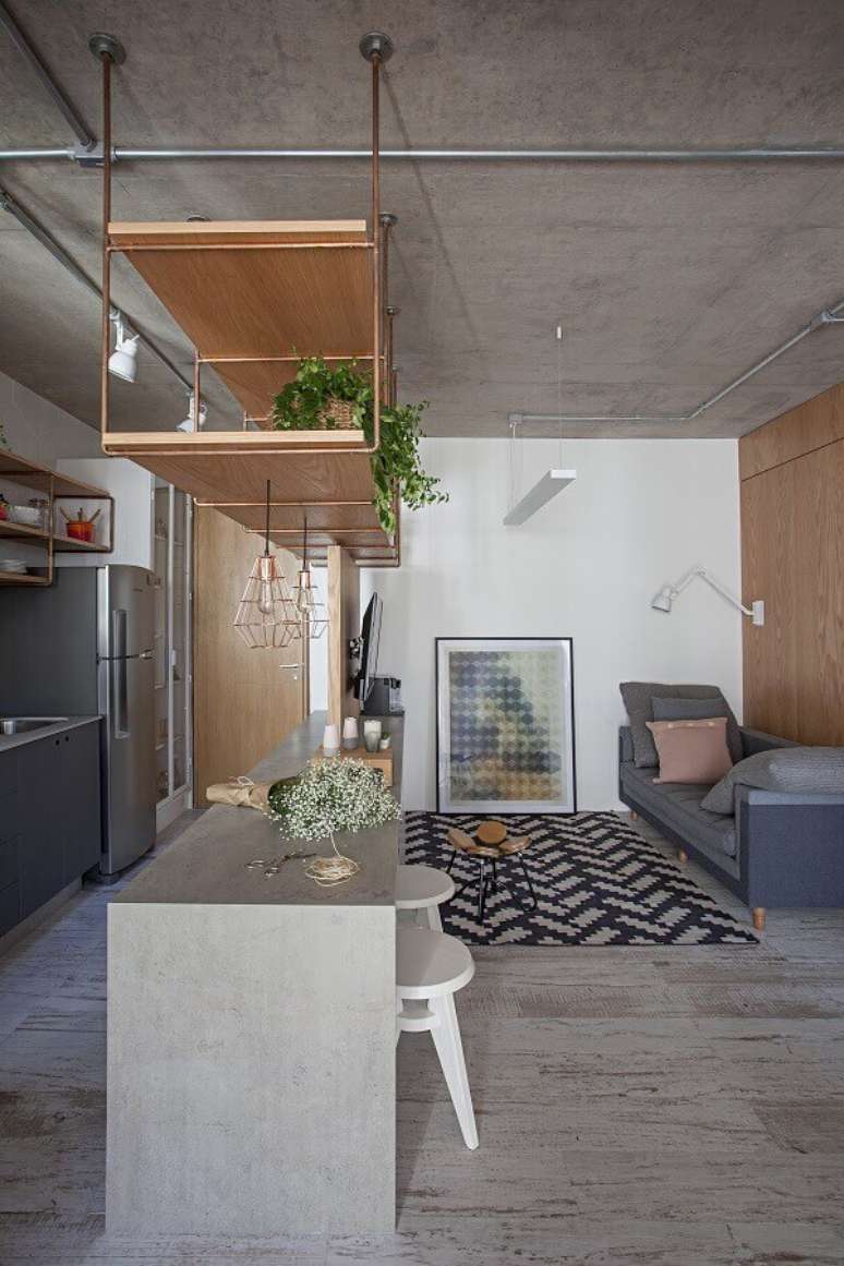 43. Decoração em estilo industrial para cozinha aberta com sala de estar – Foto: ArchDaily