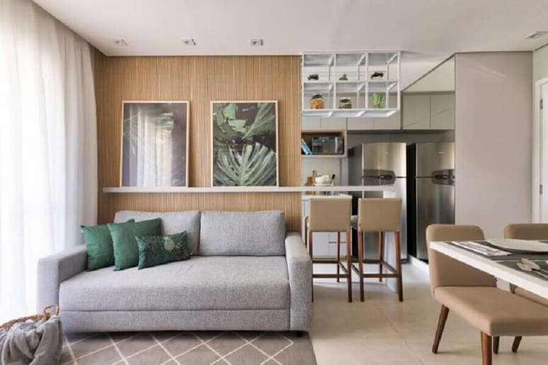 47. Sala de apartamento decorada com almofadas para sofá cinza pequeno – Foto: SP Estúdio