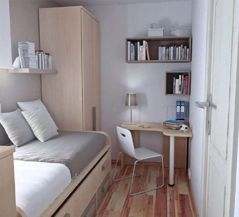 29. Decoração simples para quarto masculino pequeno com escrivaninha de canto – Foto: Essência Móveis de Design