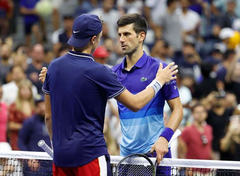 Nova Djokovic cumprimenta Nodskov Rune após partida do Aberto dos EUA
31/08/2021
Jerry Lai-USA TODAY Sports
