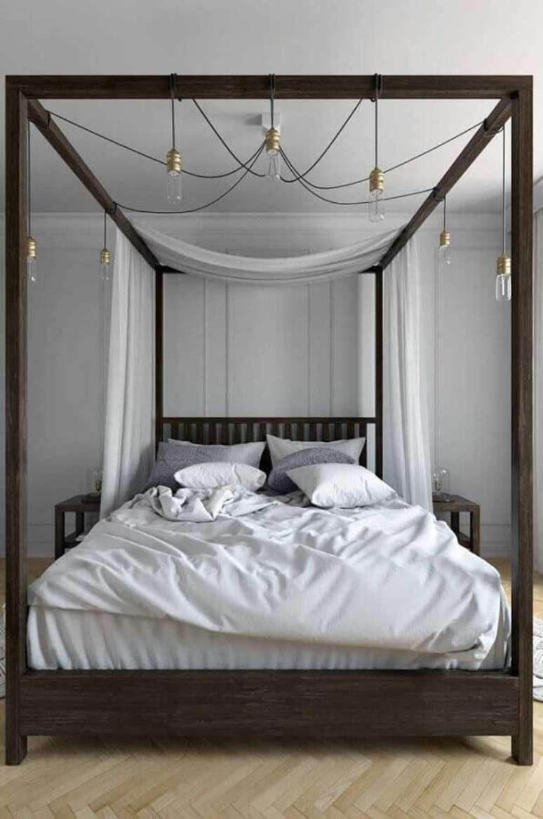 43. Dossel com mosquiteiro para quarto de casal moderno decorado em tons de cinza – Foto: Decor Fácil