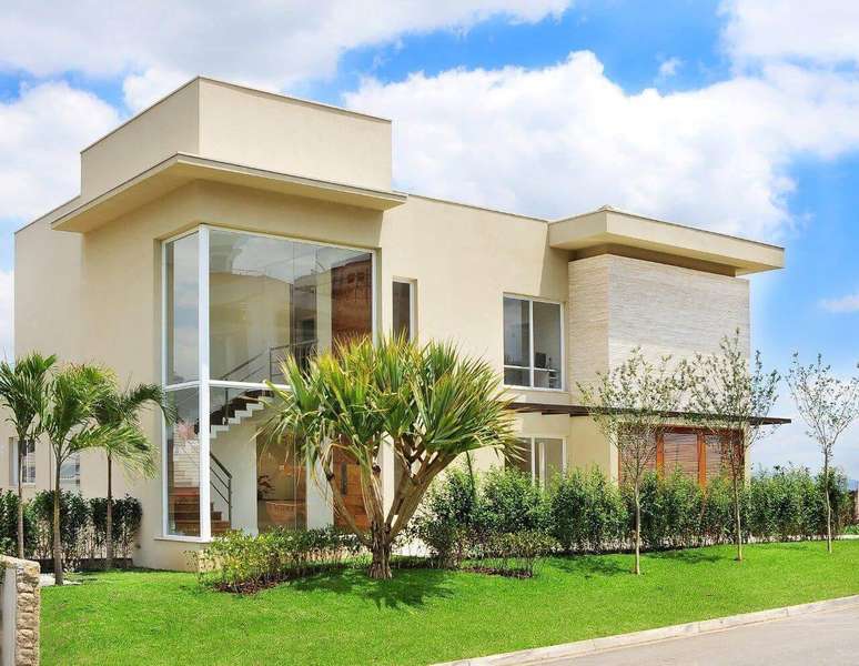 21. Casa moderna com fachada de vidro e jardim &ndash; Foto Quitete Faria