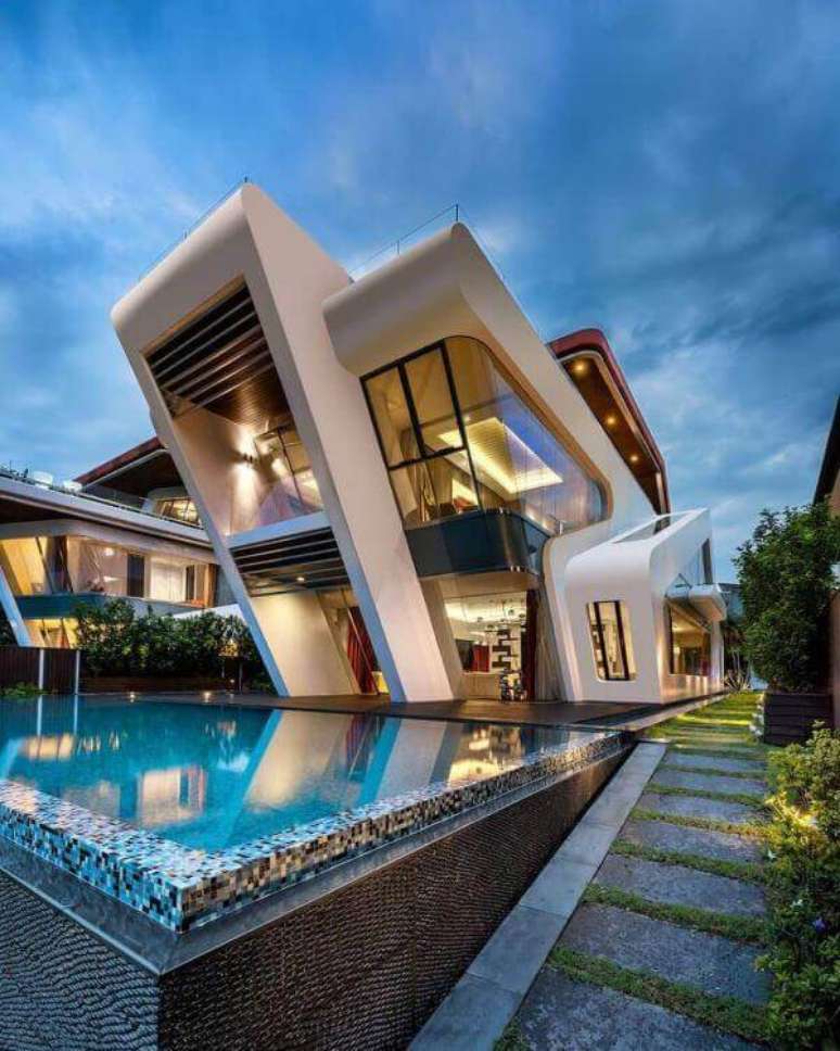 23. Decora&ccedil;&atilde;o para fachada de vidro moderna com piscina &ndash; Foto Studio Antonini e Partnesrs