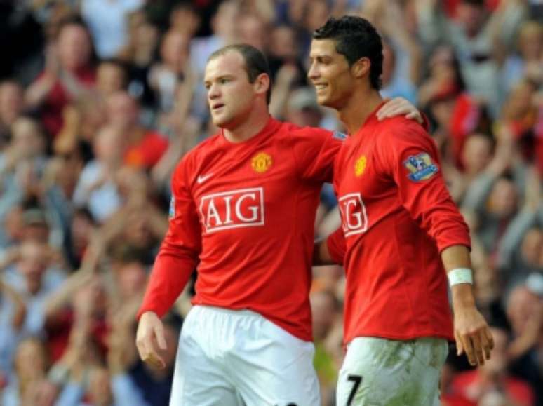 Rooney e Cristiano Ronaldo em ação juntos no Manchester United (Foto: ANDREW YATES / AFP)