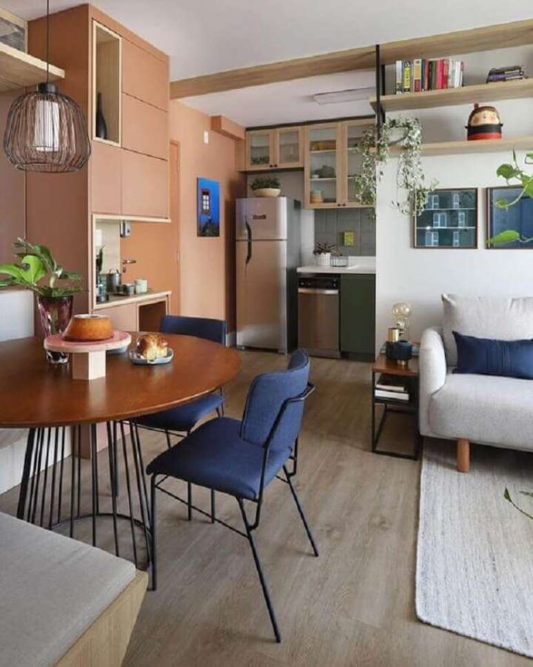 15. Decora&ccedil;&atilde;o com mesa redonda para sala de jantar e estar integradas &ndash; Foto: Mandril Arquitetura