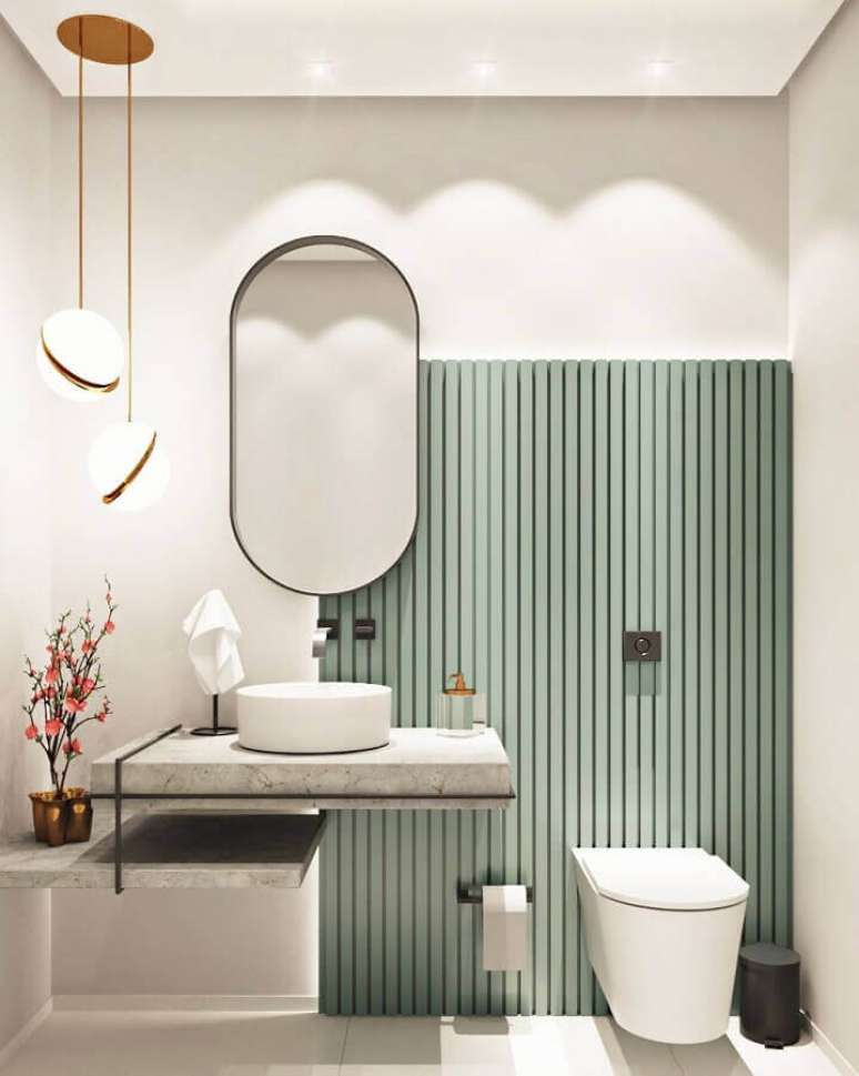 40. Luminária pendente para banheiro bonito e moderno decorado com painel ripado – Foto: Caroline Sampel