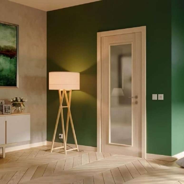 48. Modelo de porta de vidro para sala com paredes verdes. Fonte: Best Door