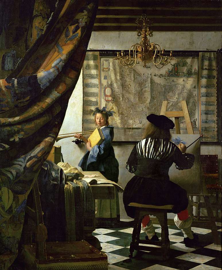 Ser&aacute; ele? Especialistas acreditam que Vermeer talvez tenha feito seu autorretrato de costas em 'A Arte da Pintura'