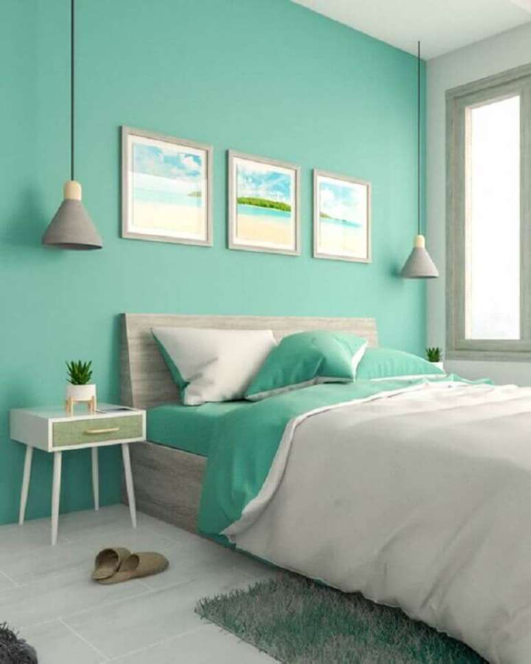 47. Parede cor ciano para decoração de quarto de casal com luminária pendente cinza – Foto: Interior Design Ideas