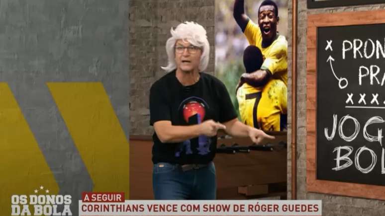 Neto usou uma peruca loura para homenagear Róger Guedes (Foto: Reprodução)