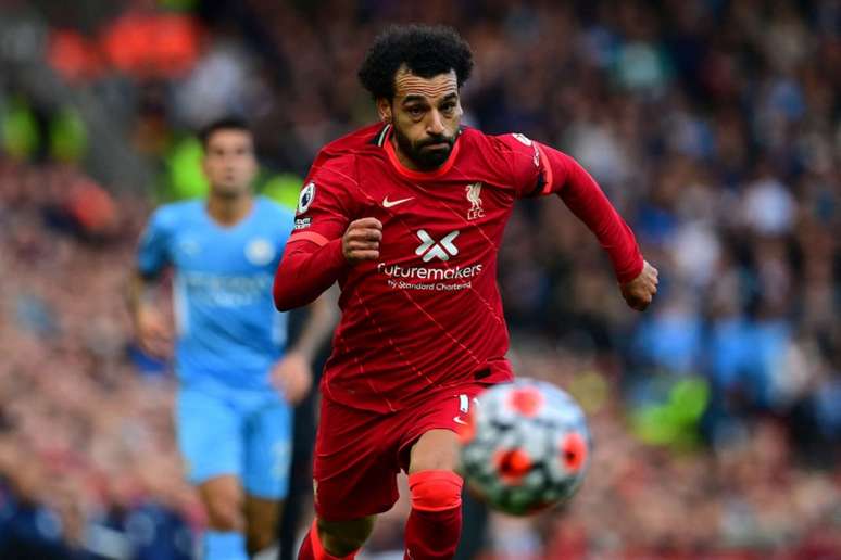Salah recentemente chegou à marca de 100 gols na Premier League (Foto: PAUL ELLIS / AFP)
