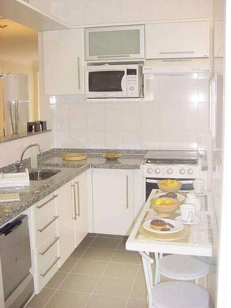 33. Decora&ccedil;&atilde;o de cozinha simples e planejada. Fonte: Decorei.org