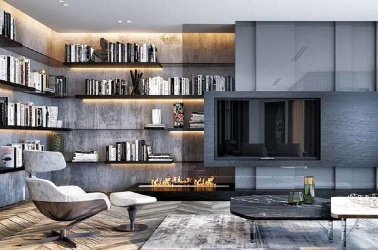 44. Cores de casas modernas para sala de TV cinza decorada com parede de cimento queimado – Foto: Futurist Architecture