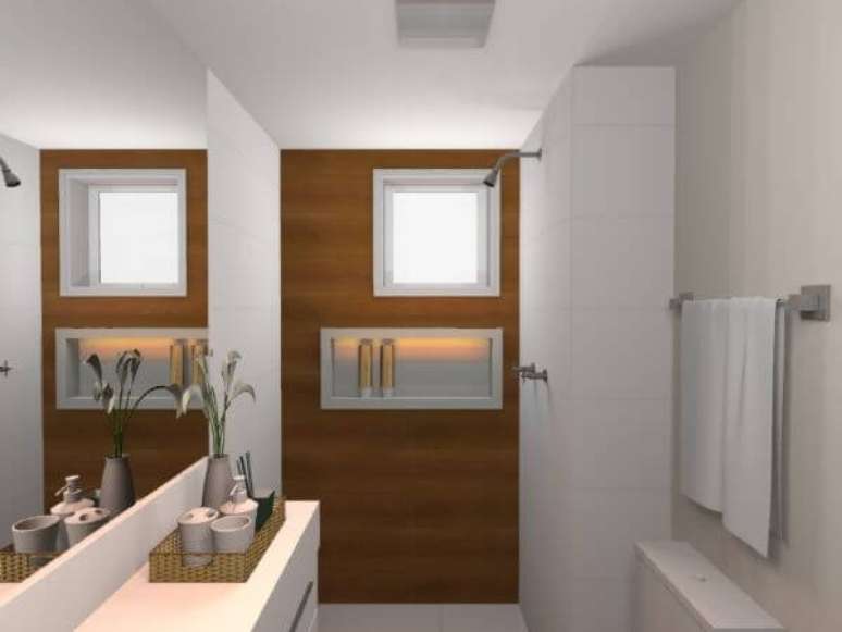 21. Banheiro pequeno com nicho de porcelanato branco &ndash; Foto Lariss Tesser