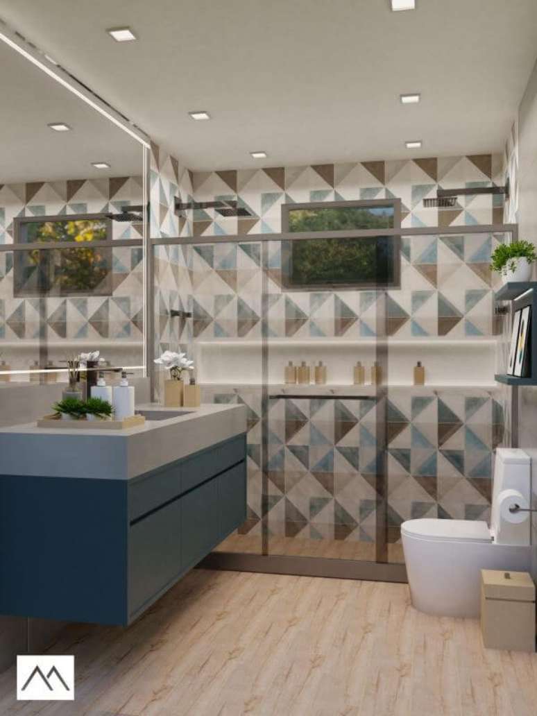 43. Revestimento triangular com nicho de porcelanato branco &ndash; Foto Studio MBS Arquitetura