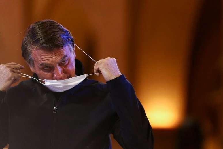 Presidente Jair Bolsonaro em missa no Santuário Nacional de Aparecida. 12/10/2021. REUTERS/Carla Carniel