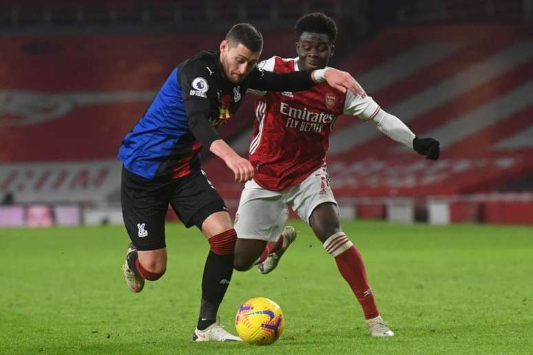 Arsenal e Crystal Palace fazem o chamado jogo de seis pontos no Campeonato Inglês (Foto: NEIL HALL / POOL / AFP)