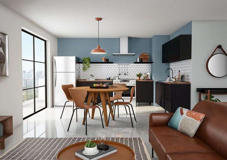 7. A integração da cozinha com a sala deixa a casa mais dinâmica e prática, valorizando sua arquitetura – Foto: Tok&Stok