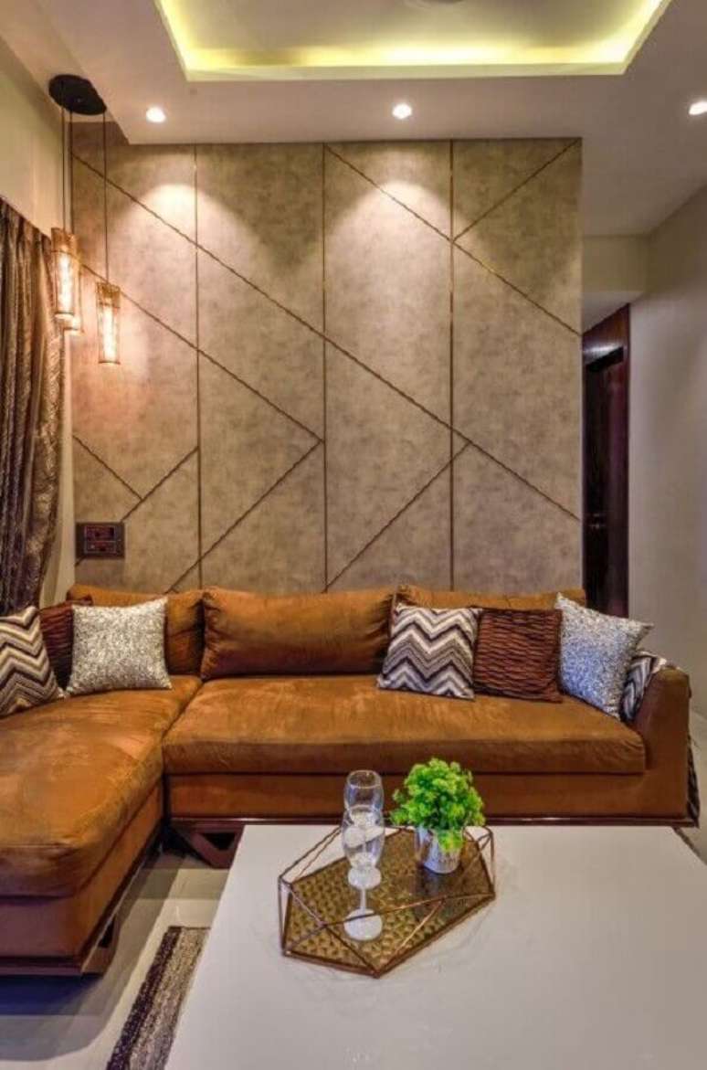 33. Iluminação sala de estar bege moderna decorada com sofa de canto – Foto: The Architect s Diary
