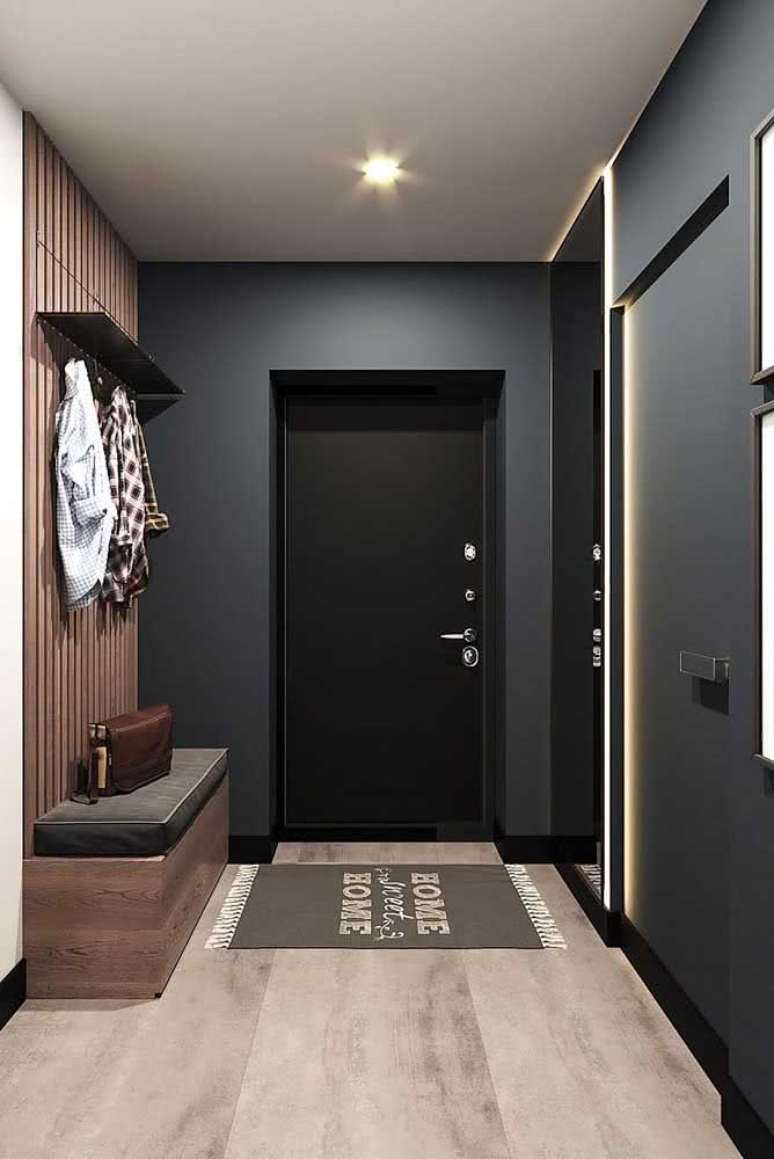 46. Porta preta na entrada com tapete de frases &ndash; Foto Decor Facil