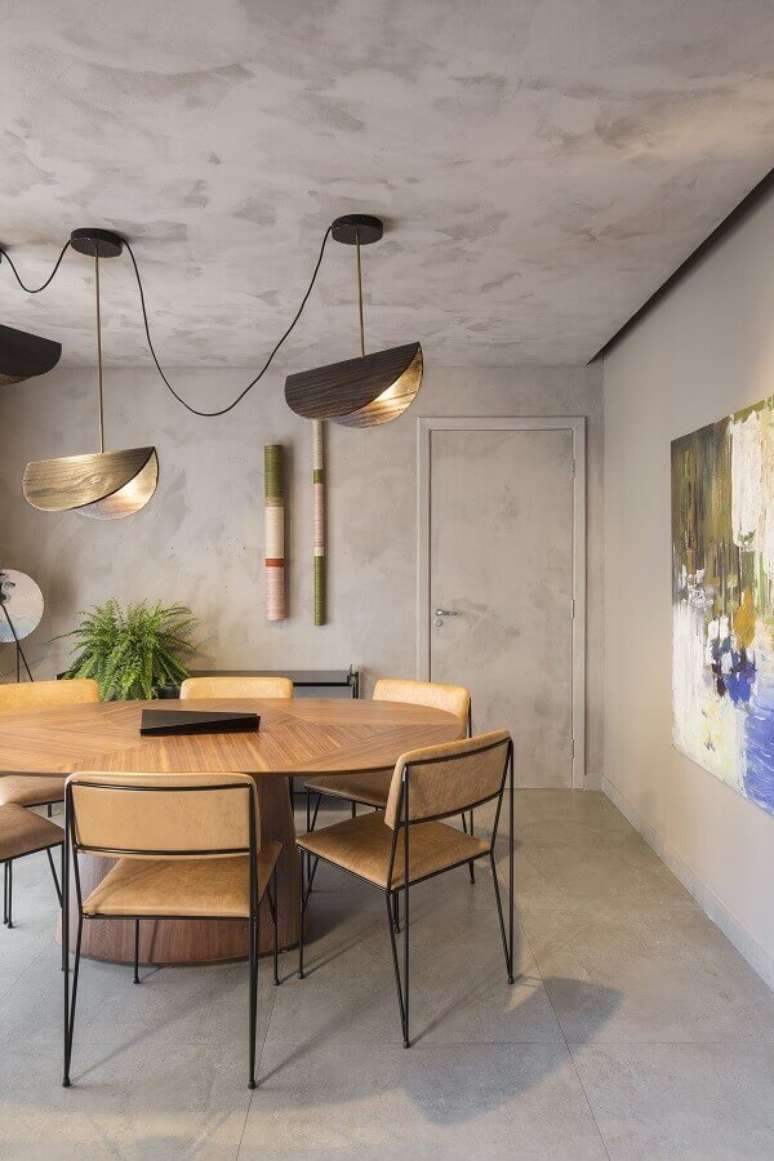 53. Mesa com cadeira almofadada para decoração estilo industrial de sala de jantar – Foto: Archdaily