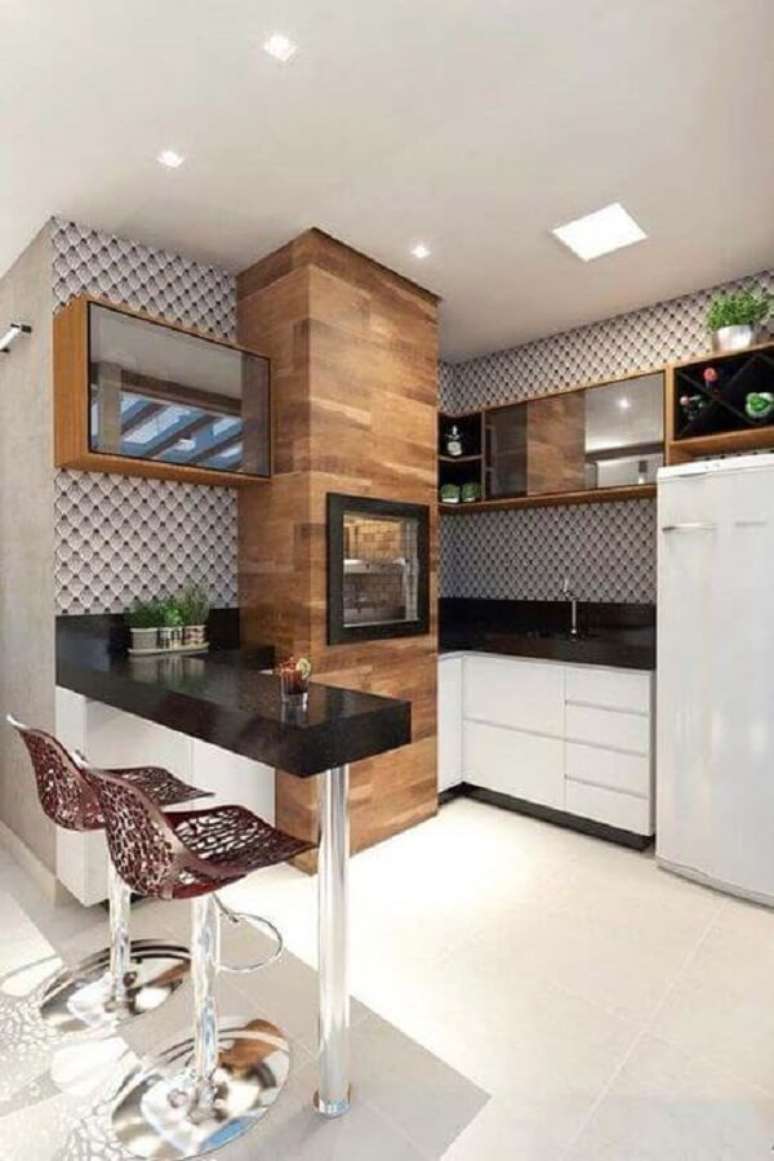 60. Decora&ccedil;&atilde;o com bancada de granito para cozinha moderna &ndash; Foto Eduardo Muzzi Designer