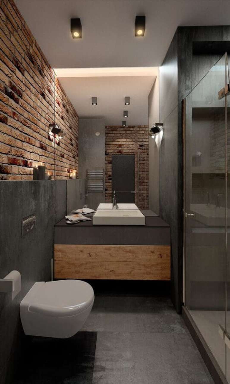 17. Banheiro industrial moderno decorado com parede tijolinho rústica – Foto: Houzz
