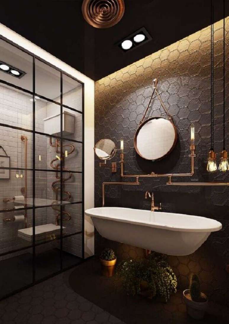 29. Decoração de banheiro industrial com revestimento hexagonal preto – Foto: Decor Fácil