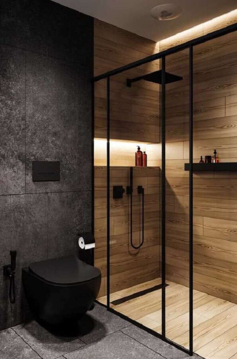 30. Decoração de banheiro moderno com nicho embutido no box de madeira – Foto: Futurist Architecture