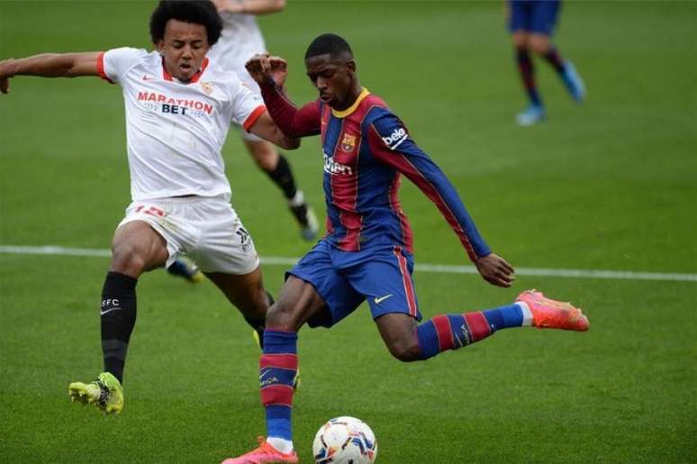 Sevilla e Barcelona se enfrentam em jogo atrasado da La Liga nesta terça-feira (Foto: CRISTINA QUICLER / AFP)