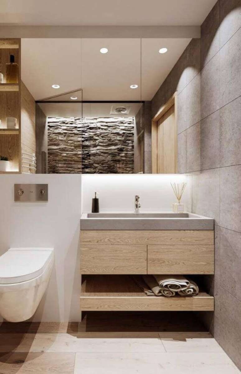 35. Cuba de porcelanato cinza com torneira de parede &ndash; Foto Home Fashion Trend