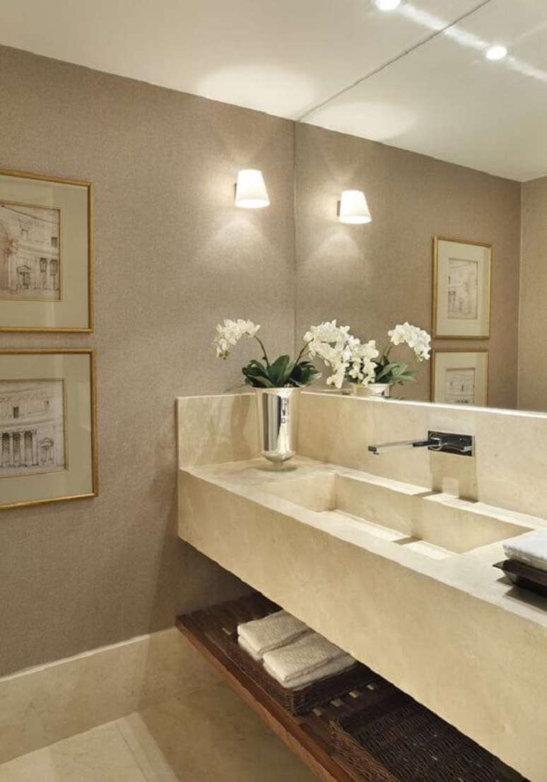 38. Cuba esculpida de porcelanato com torneira de parede &ndash; Foto Casa de Valentina