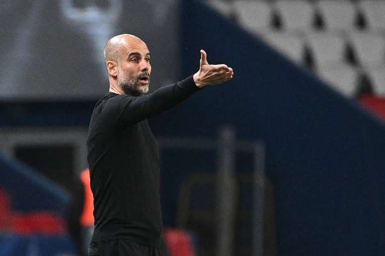 Pep Guardiola está no comando do Manchester City desde 2016 (Foto: ANNE-CHRISTINE POUJOULAT / AFP)