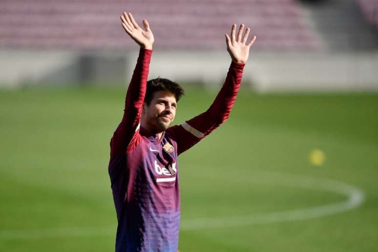 Gerard Piqué é ídolo e já venceu tudo com o Barcelona (Foto: PAU BARRENA / AFP)